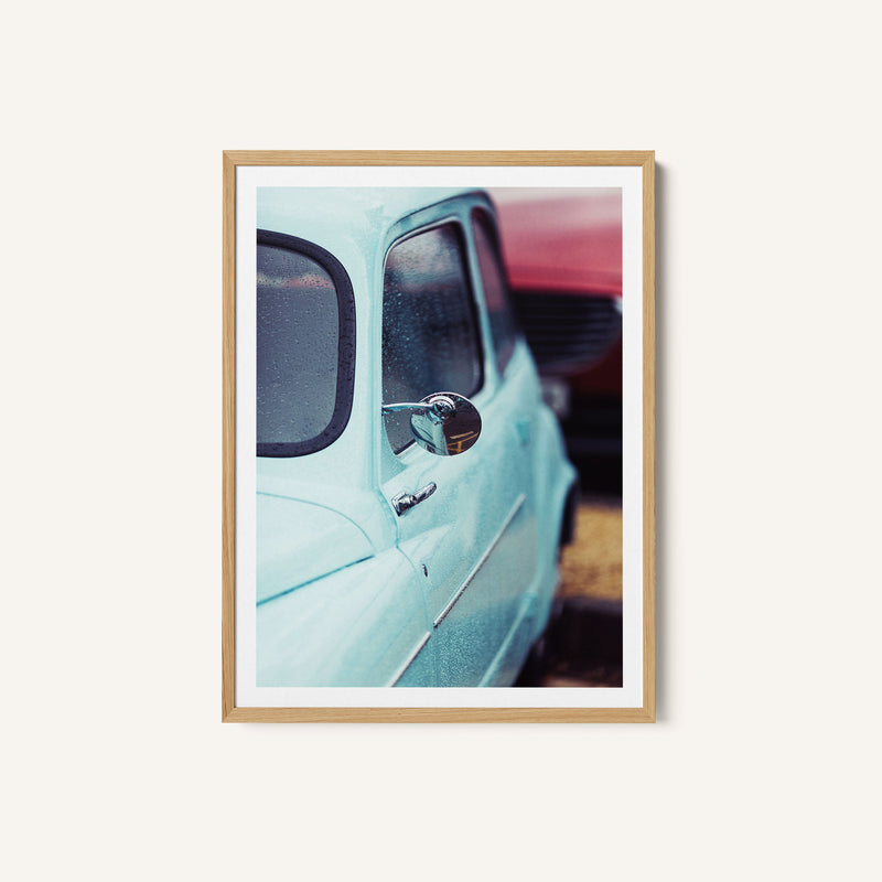 Vintage Blue Car with Raindrops